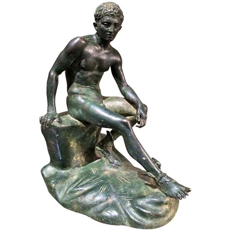 hermes a riposo|seated Hermes statue.